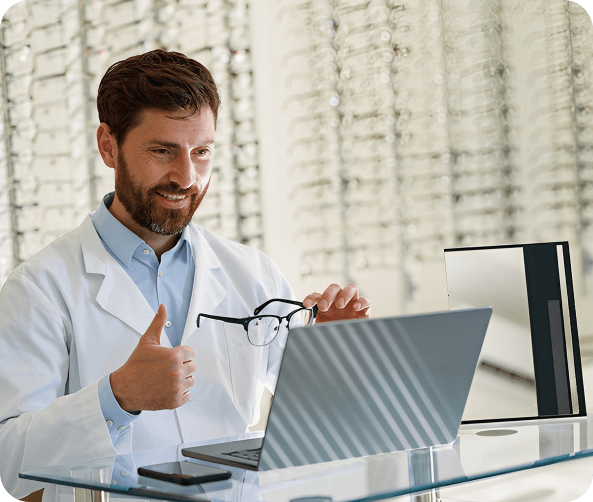 Eye doctor giving thumbs up